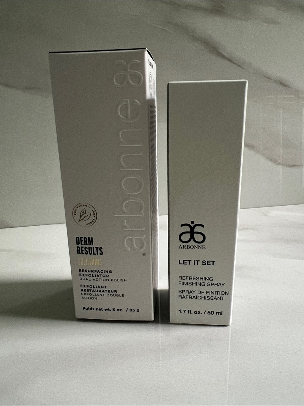 Arbonne Derm Results exfoliator and Let it Set finishing spray